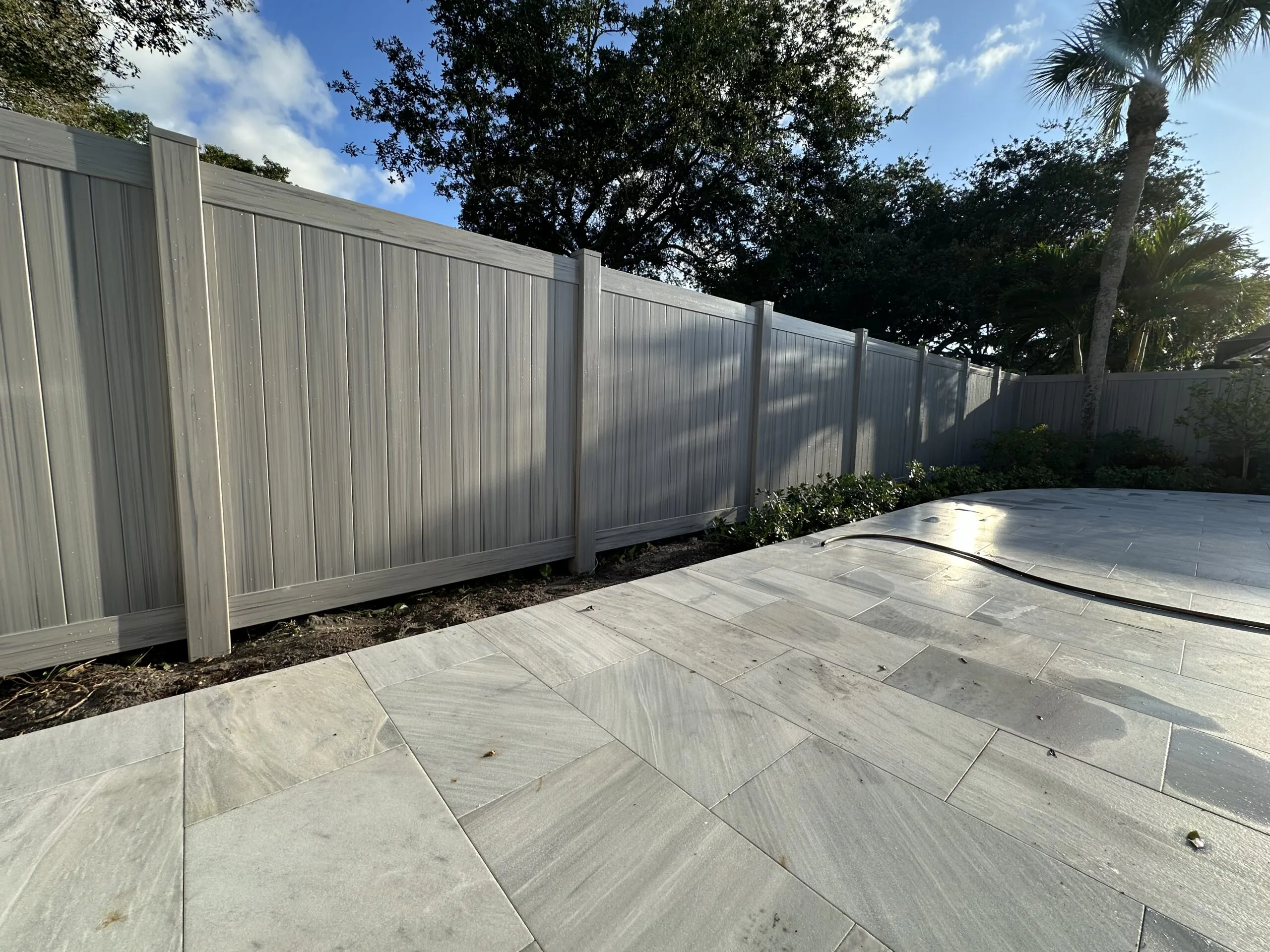 PUTTING UP A VINYL FENCE — XL Fencing