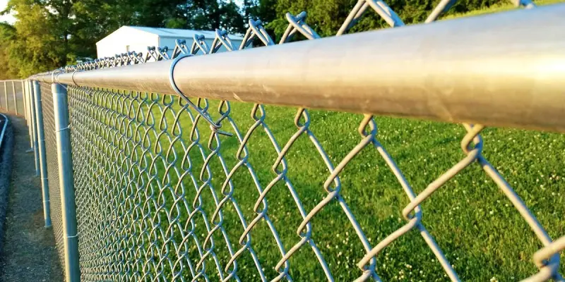 Galvanized chain link fence installed on commercial property in South Florida