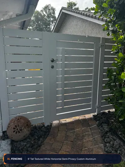 Custom 6-foot textured white horizontal-slat aluminum swing gate in Palm Beach County, Florida