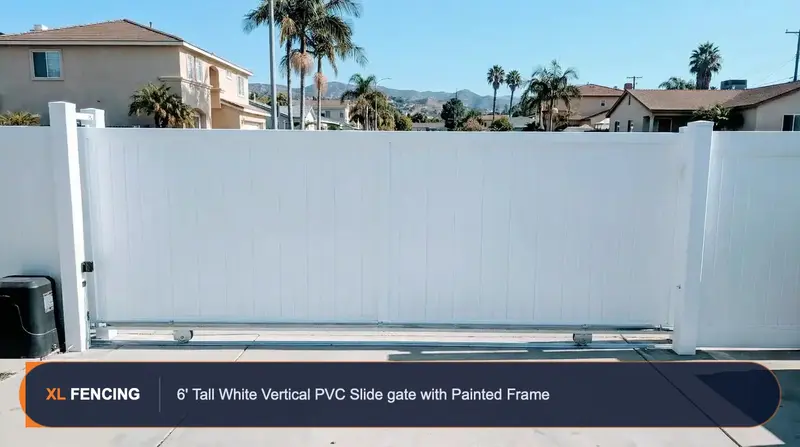 6-foot white PVC vertical privacy slide gate with painted aluminum frame, driveway application