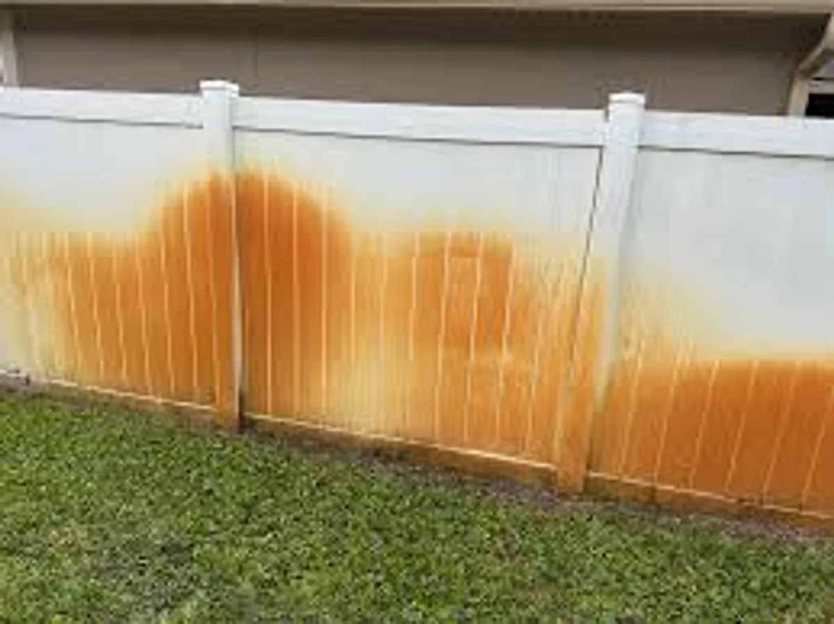 Why Well-Water Sprinklers Stain Your Fence — and How to Stop It — XL Fencing South Florida