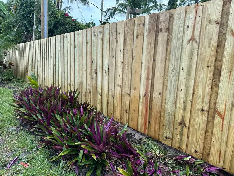 Board-on-board wood fence installed in Deerfield Beach, FL